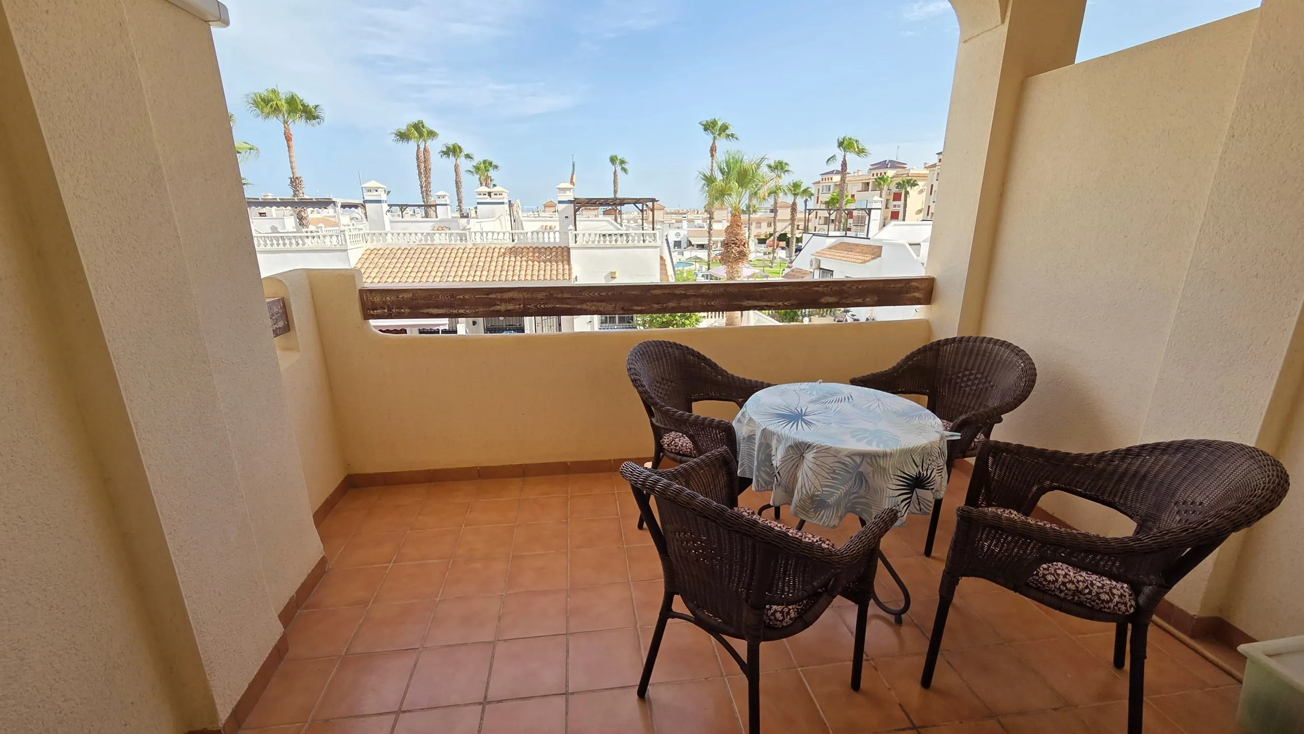 Furnished balcony with table and chairs